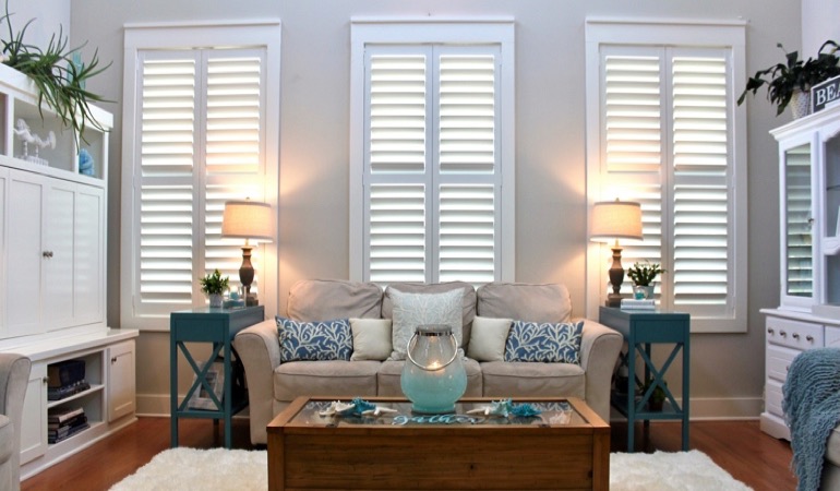 Philadelphia modern sunroom with white shutters 